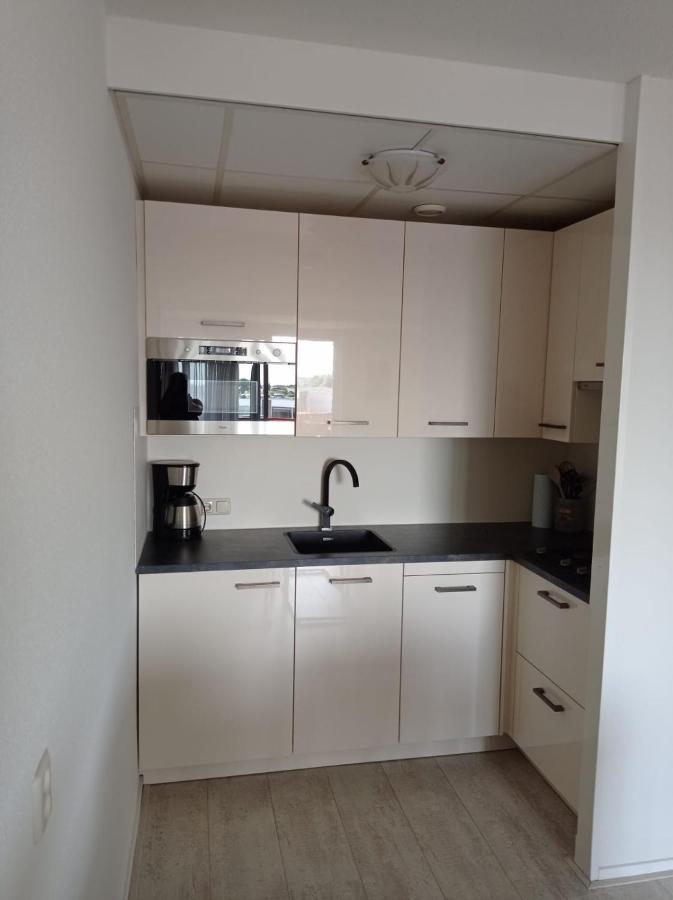 Appartement Ijsselmeer Makkum Strand Extérieur photo
